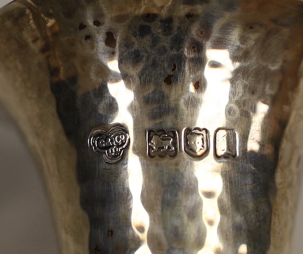 An Edwardian Art and Nouveau planished silver posy vase by Goldsmiths and Silversmiths Co. Ltd, 12.7cm, weighted.